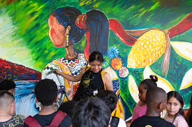 A Vibrant Mural Celebration of Maya Traditions and Grandmother Earth’s Gifts by Evelyn Morán Cojoc