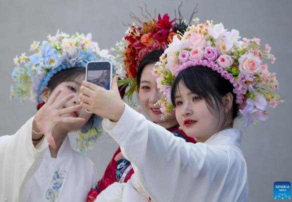 Xunpu Village Blossoms into a Vibrant Tourism Hub Thanks to Iconic Flowery Headwear